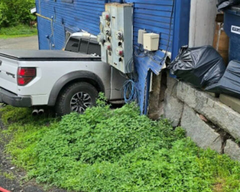 Four households evacuated after pickup truck crashes into apartment building