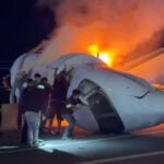 1 killed when small plane crashes on Texas highway. People leave vehicles to try to help