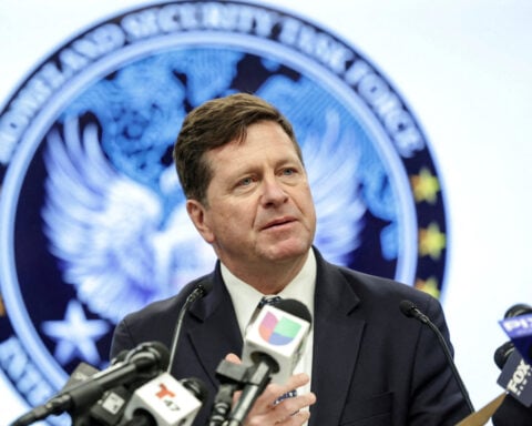 Trump delays spy nominee Clayton's confirmation, wants voter ID law