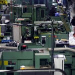 Japan manufacturers' sentiment rises for second month on chip-driven demand: Reuters Poll