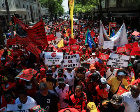 South African labour unions urge workers to shun anti-migrant protests