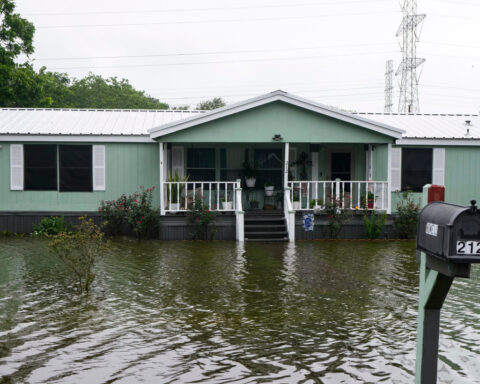 Tropical Cyclone Arthur weakens to a low pressure area along the upper Texas coast