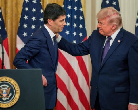 Warsh Fed holds rates steady. Trump says 'It's all right. Whatever.'