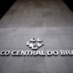 Brazil cuts interest rates again, leaves door open for more