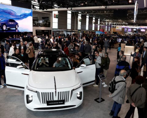 At Hong Kong auto show, China automakers target wealthy in right-hand-drive markets