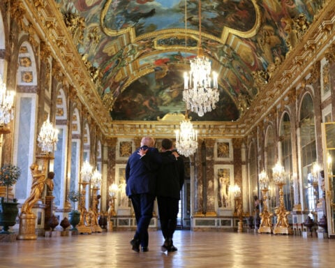 Macron's Versailles diplomacy wins mixed results over decade in power