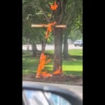 Man who admitted setting cross on fire in Chicago park is charged with a hate crime