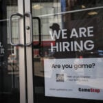 US weekly jobless claims fall, but remain elevated