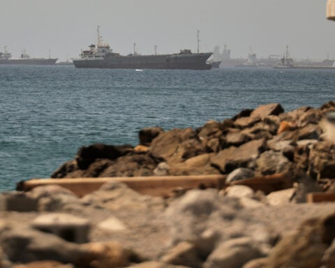 Stranded ships have begun transiting the Strait of Hormuz, maritime data company says