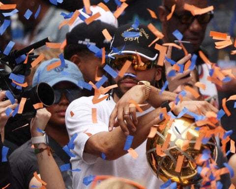 Euphoric Knicks fans flood New York for championship ticker-tape parade