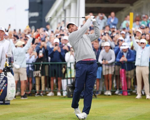 Golf-Tough start for Scheffler in bid for career Slam, play suspended due to darkness at US Open