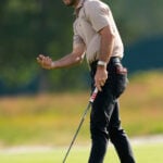 Amateur Ryder Cowan takes the early lead and is tied for second in a strong US Open debut