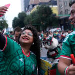 Rescue dog Osito steals hearts at the World Cup, one bike ride at a time