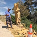 Colorado artist carves 200-year-old stump into cowboy sculpture