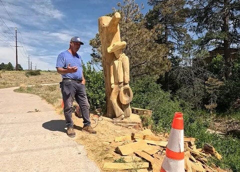 Colorado artist carves 200-year-old stump into cowboy sculpture