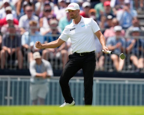 A year after smashing a locker, Wyndham Clark finds himself leading at another US Open