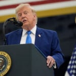 President Donald Trump unveils the new Air Force One, a converted Qatari jet