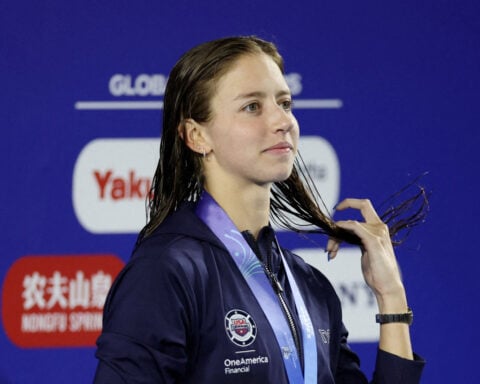 Swimming-American Douglass breaks 50m freestyle world record