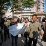 An Israeli strike hits a Gaza City apartment, killing 2 children, Palestinian health officials say