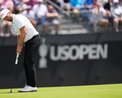 A year after smashing a locker, Wyndham Clark finds himself leading at another US Open