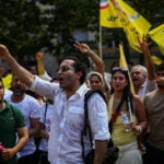 Paris police arrest 20 as demonstrators defy ban on Iran opposition rally