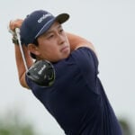 Dylan Wu laughs at himself after five-putting his first hole in the third round at the US Open