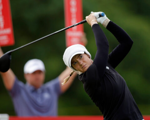 Jing Yan maintains lead in the wind-swept Meijer LPGA Classic