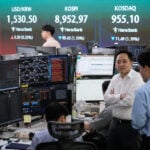 Asian shares are mixed and US futures fall as Iran talks make progress