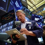 Wall St futures muted as investors monitor US-Iran negotiations