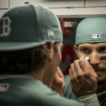 Why do baseball players put a black mark under their eyes?