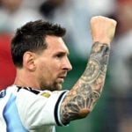 Soccer-Messi breaks World Cup scoring record with a stunning double