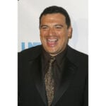 Comedian Carlos Mencia pleads not guilty to 12 felony charges of failure to pay taxes