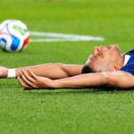 Kylian Mbappé scores 2 goals to lead France to 3-0 win over Iraq and into World Cup knockout stage