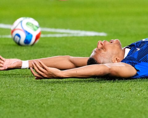 Kylian Mbappé scores 2 goals to lead France to 3-0 win over Iraq and into World Cup knockout stage