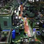 Japan's factory activity expands at faster pace in June as new orders surge