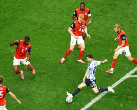 Soccer-Messi breaks World Cup scoring record with a stunning double