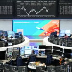 European shares slip on Fed hike bets, tech drag