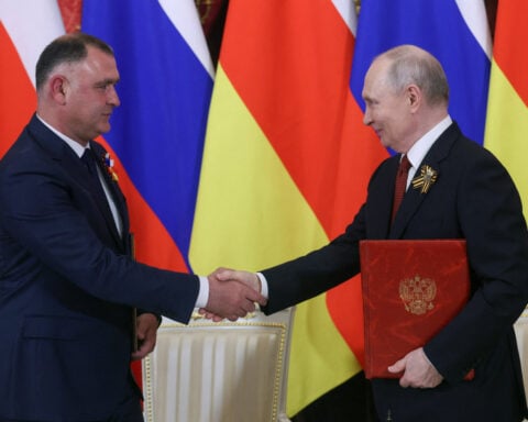 Leader of Russia-backed Georgian region resigns to become Putin adviser
