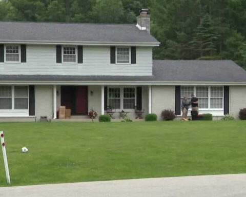 Father shot on Father's Day expected to survive, son in custody