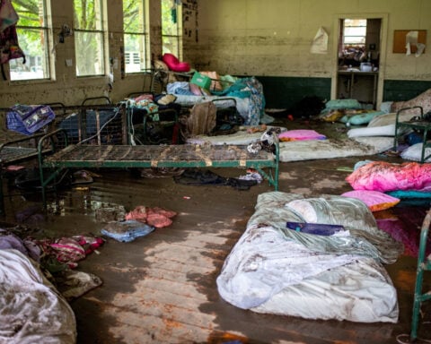Texas camp where 28 died in floods files for bankruptcy