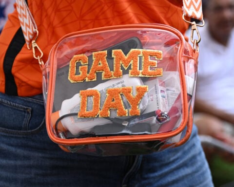 Soccer-Clear-bag rule at World Cup venues catches some fans unawares