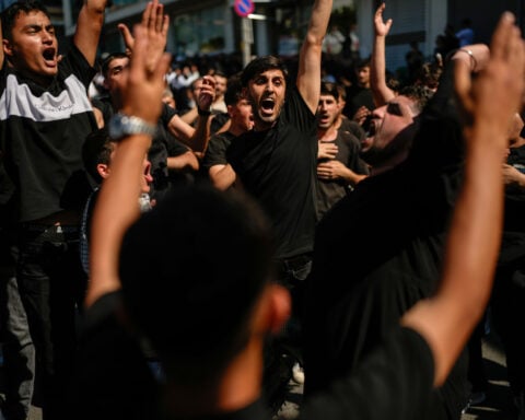 Shiite Muslims mark holy day of Ashoura after months of war in Iran and Lebanon