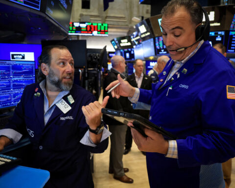 Wall St opens higher after Micron revives AI optimism, upbeat economic data