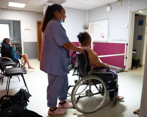 In sweltering French hospital, air-conditioned waiting room offers some relief