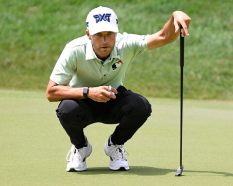 Eric Cole opens with a 63 at the Travelers Championship to lead Scheffler and others by 1
