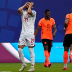 Brian Brobbey and the Dutch roll in the rain to a 3-1 win over Tunisia to top World Cup Group F