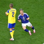 Japan and Sweden play to 1-1 draw as both advance to knockout round at the World Cup