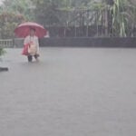 Torrential rain from passing typhoon shuts down southern Taiwan, rail line cut
