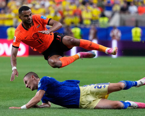 Brian Brobbey and the Dutch roll in the rain to a 3-1 win over Tunisia to top World Cup Group F