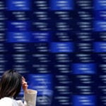 Asian shares fall as Apple's price hikes dents tech optimism